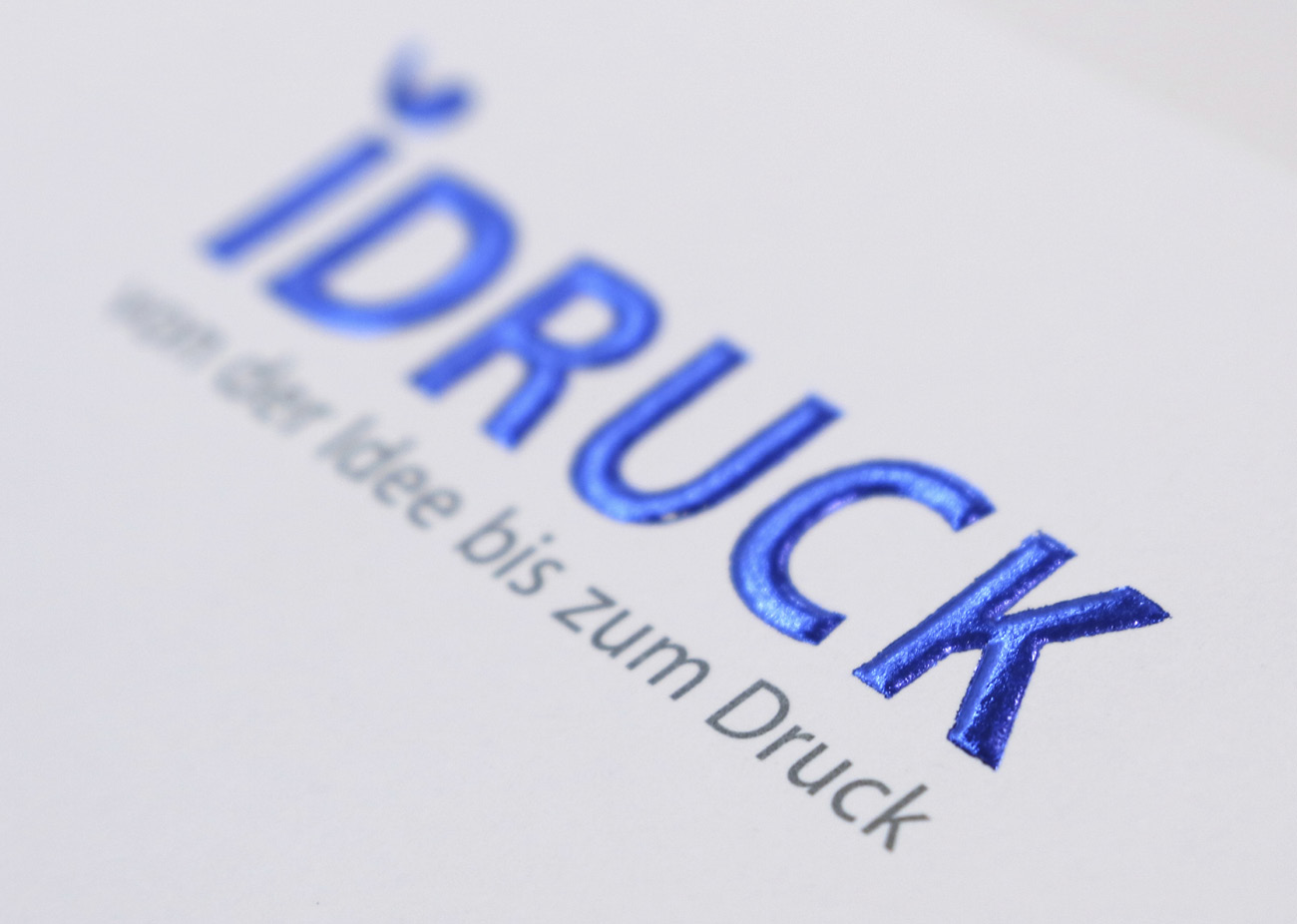 iDruck Logo in Folienheissprägung